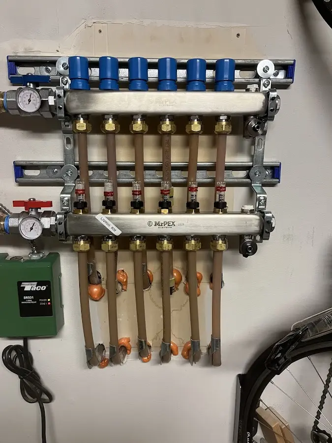 Plumber performing Water Heater Repair at a residential property in Montrose